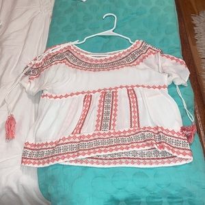 Very cute top with tassels